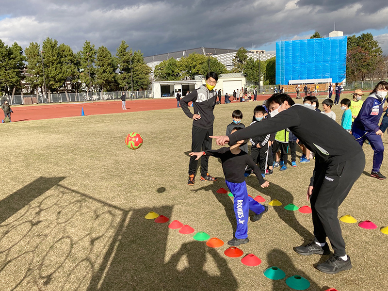 狙い方を教える田中さん 狙い方を教える田中さん